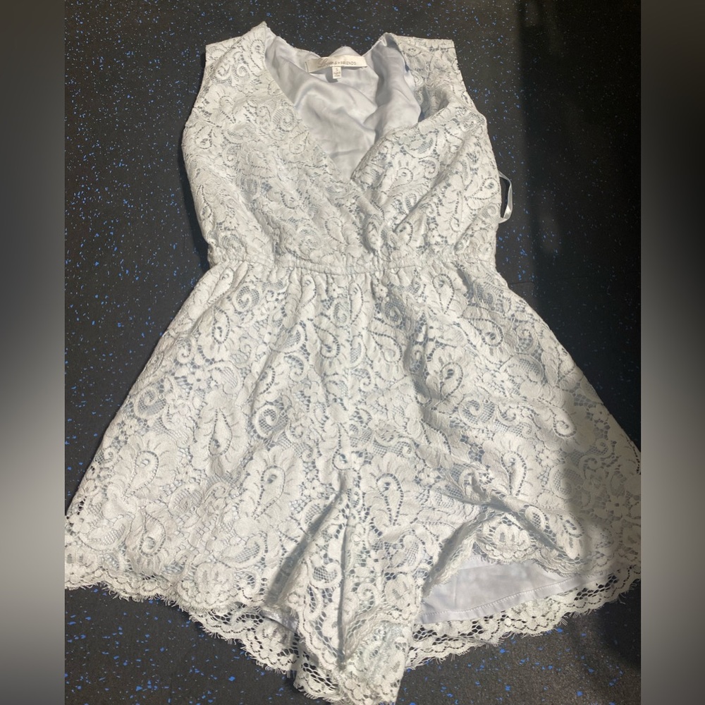 Lovers and friends romper size small never worn